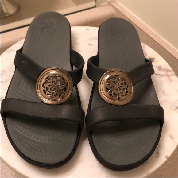 crocs gold flip flops
